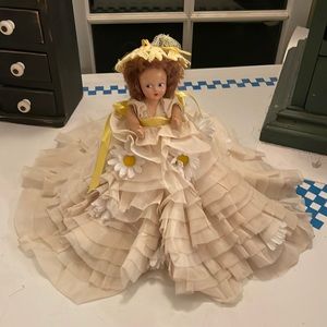VINTAGE DOLL DARK HAIR PLASTIC ? MATERIAL LAYERED DRESS 8 inches